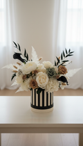 Grand bespoke arrangement with cream-and-black packaging